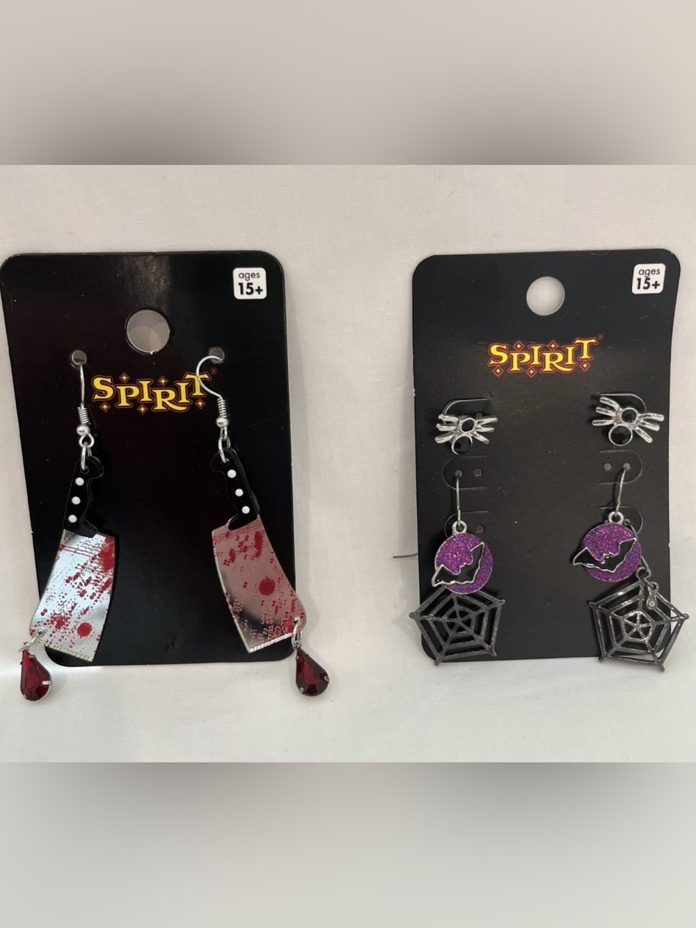 Spirit Halloween Red and Silver Bloody Cleaver Dangle Earrings